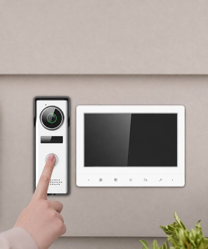 Dahua outdoor camera and indoor video intercom monitor installed on a wall